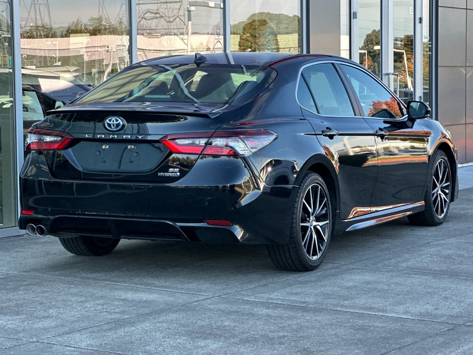 Used 2023 Midnight Black Metallic Toyota SE image 4
