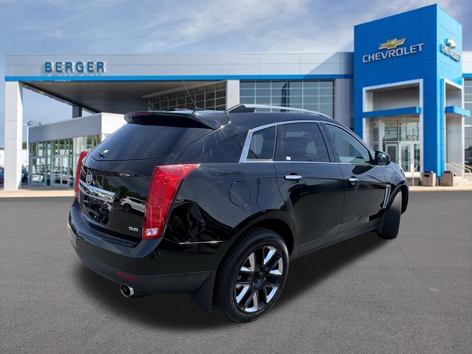 Used 2013 Cadillac SRX Performance Collection with VIN 3GYFNHE31DS578775 for sale in Grand Rapids, MI
