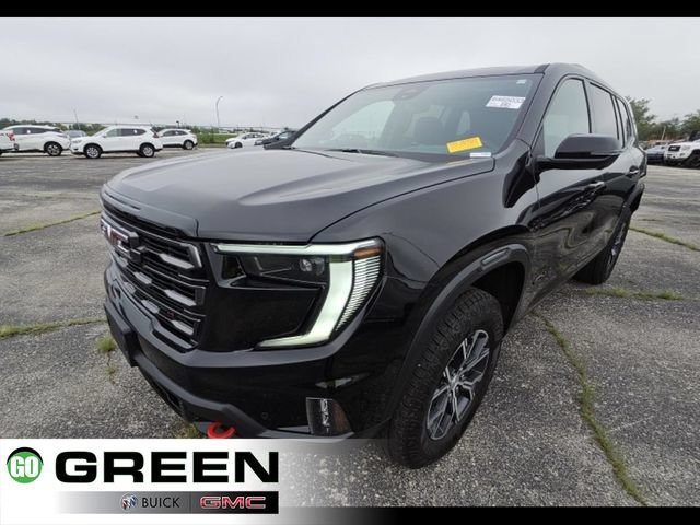 Used 2026 Ebony Twilight Metallic GMC AT4 image 1