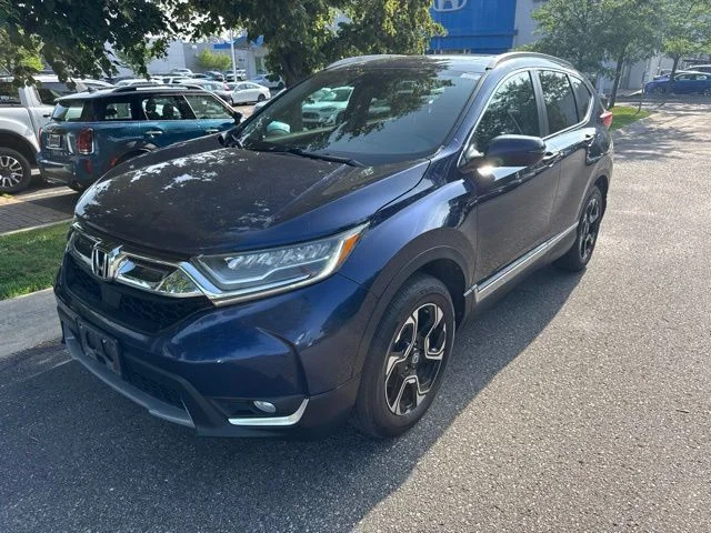 Used 2017 Obsidian Blue Pearl Honda Touring image 1
