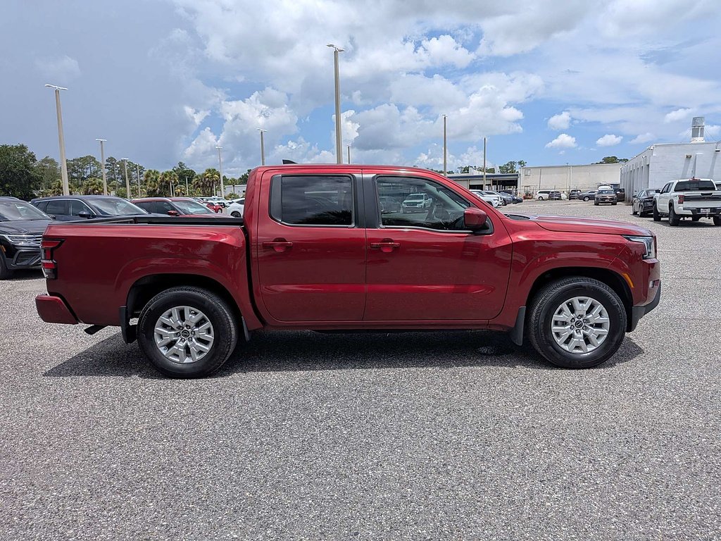 Used 2024 Cardinal Red Metallic TriCoat Nissan 4x2 SV 4dr Crew Cab 5 ft. SB image 2