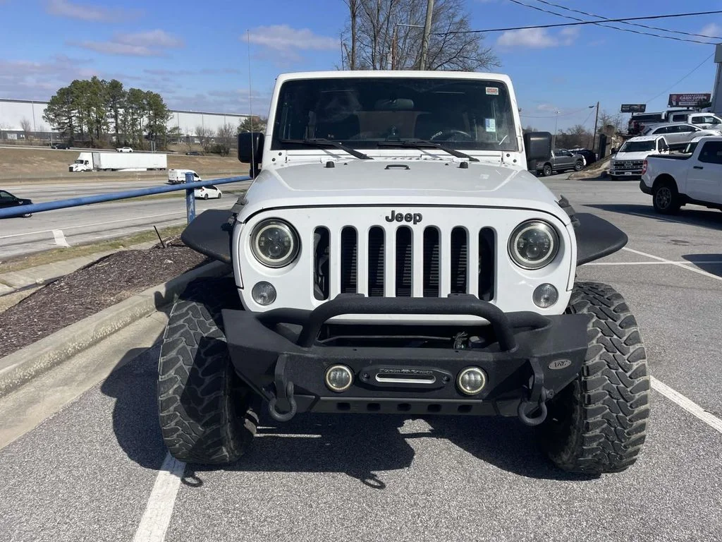 Used 2015 White Jeep Unlimited Sport image 10