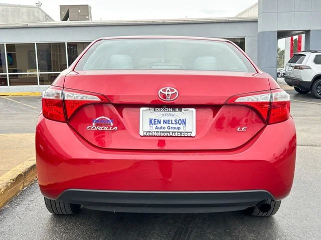 Used 2016 Barcelona Red Metallic Toyota LE image 9