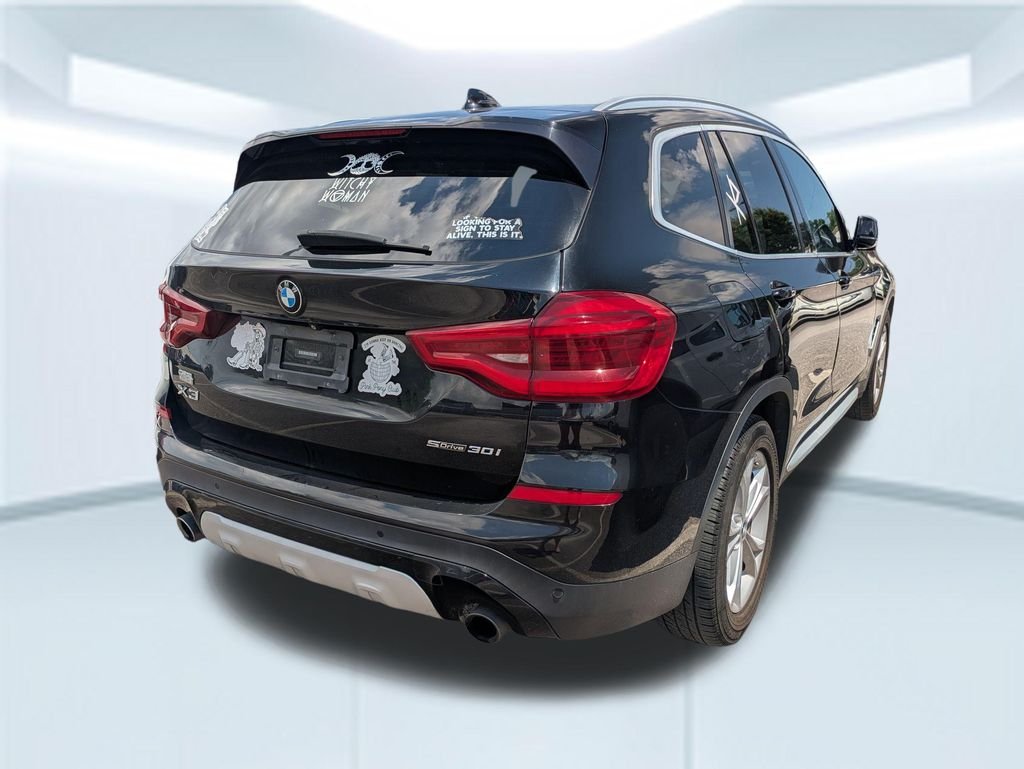 Used 2019 Black BMW sDrive30i image 2