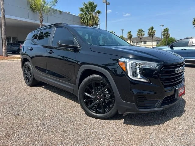 Used 2024 Ebony Twilight Metallic GMC SLE image 1