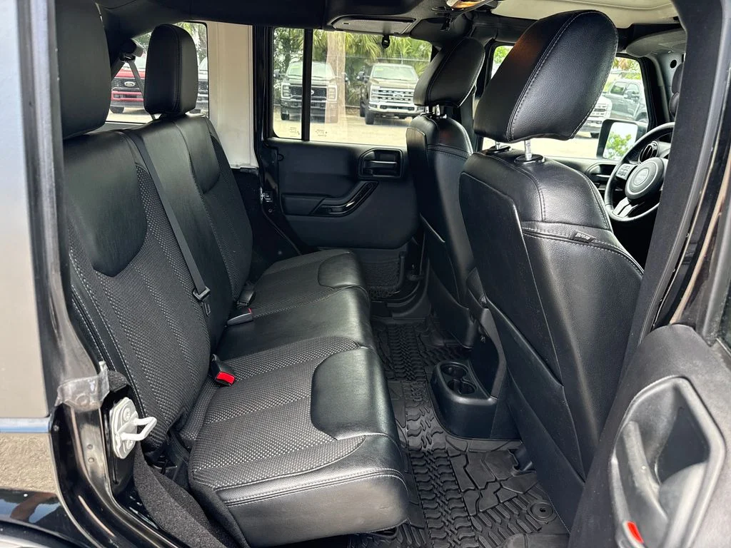 Used 2016 Black Jeep Unlimited Sahara image 22