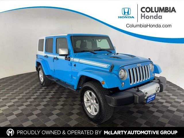 Used 2017 Blue Jeep Unlimited Sahara image 1