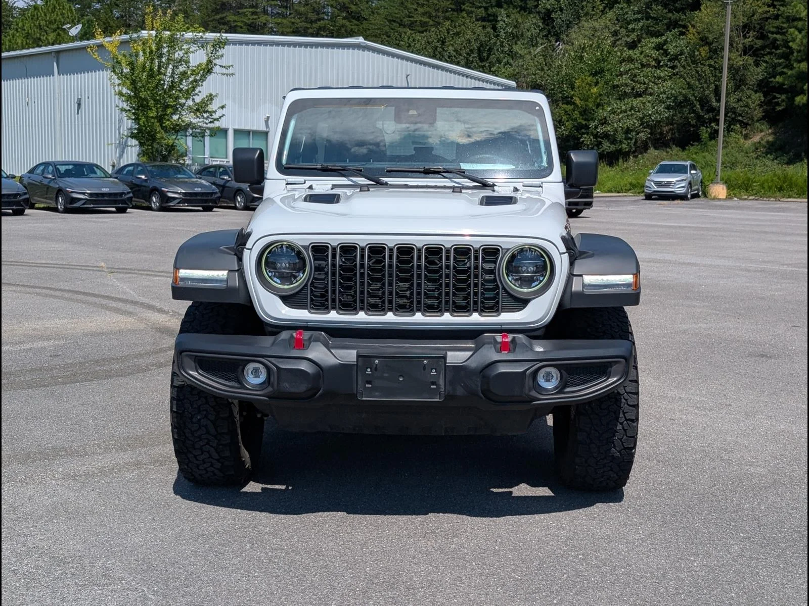 Used 2025 Bright White Clear Coat Jeep Rubicon image 2