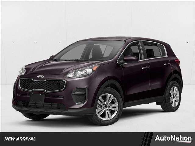 Used 2018 Black Cherry Kia LX image 1