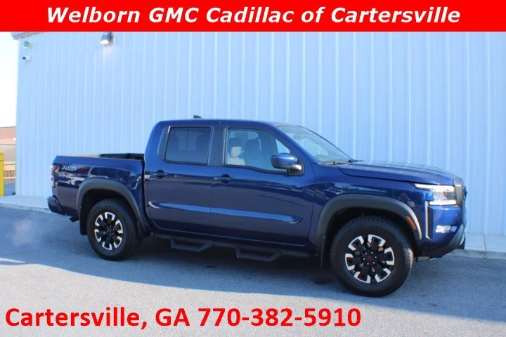 Used 2022 Blue Nissan Crew Cab PRO-4X 4x4 image 1