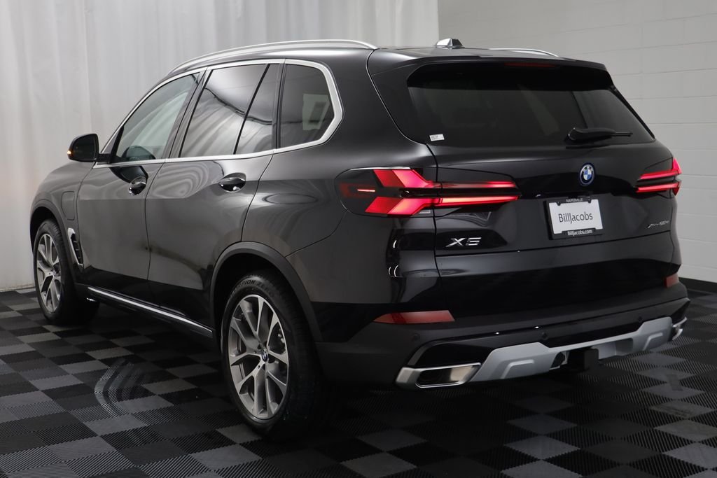 New 2026 Black Sapphire Metallic BMW xDrive50e image 17