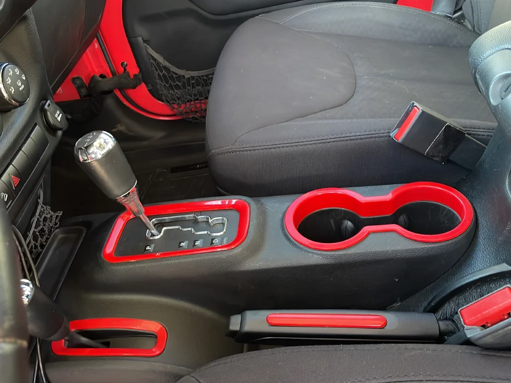 Used 2013 Red Jeep Unlimited Sport image 22