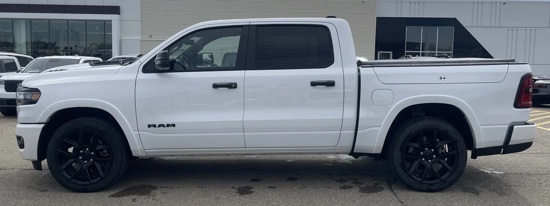 Used 2025 Ivory Tri-Coat Pearl Ram LARAMIE image 2