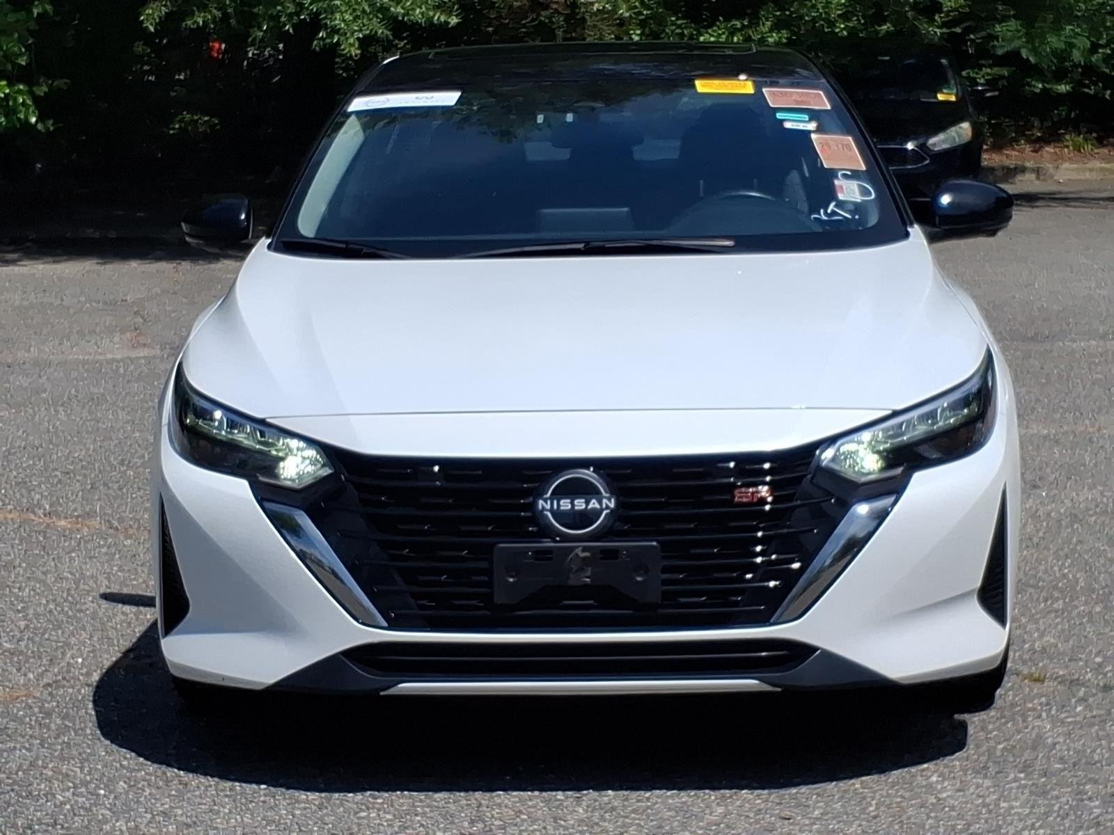 Used 2025 Aspen White Tricoat/Super Black Nissan SR image 2