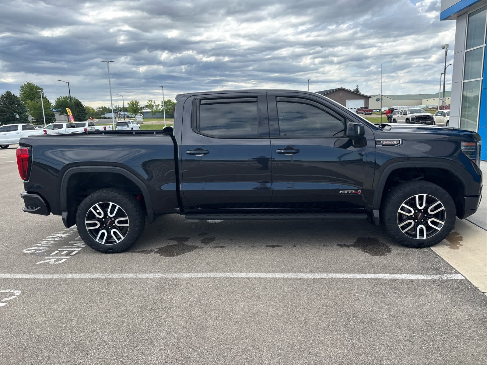 Used 2023 GMC Sierra 1500 AT4 with VIN 1GTUUEEL7PZ263159 for sale in Spring Valley, Minnesota