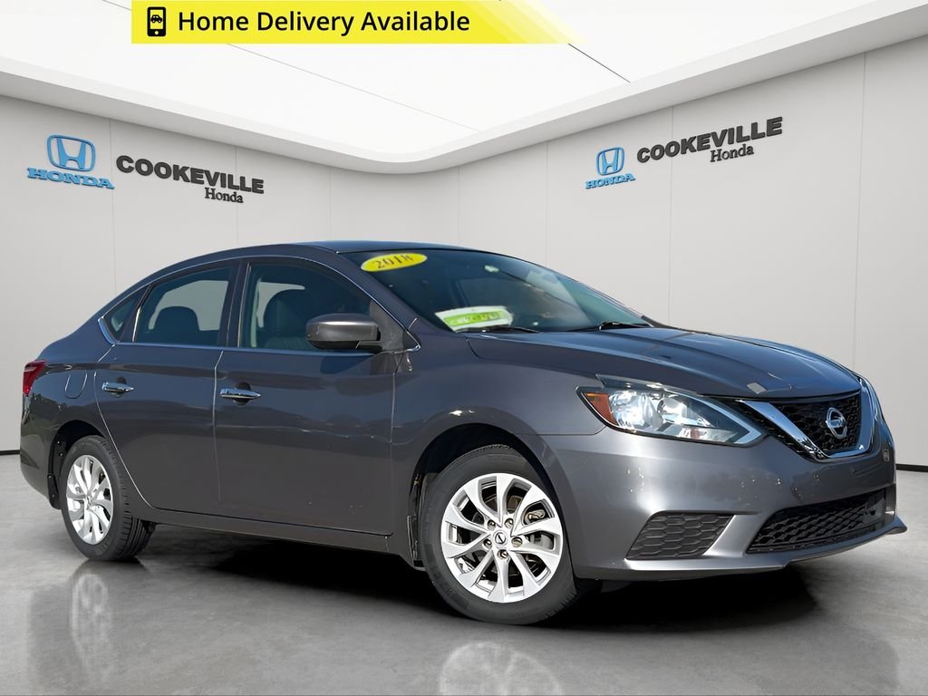 Used 2018 Gun Metallic Nissan SV image 1