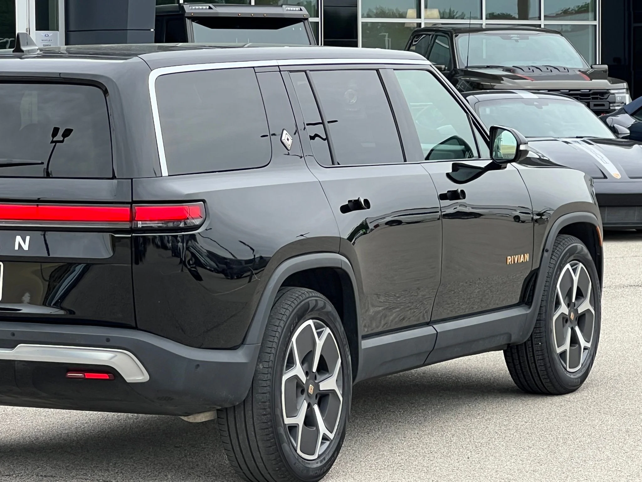 Used 2024 Black Rivian Adventure image 13