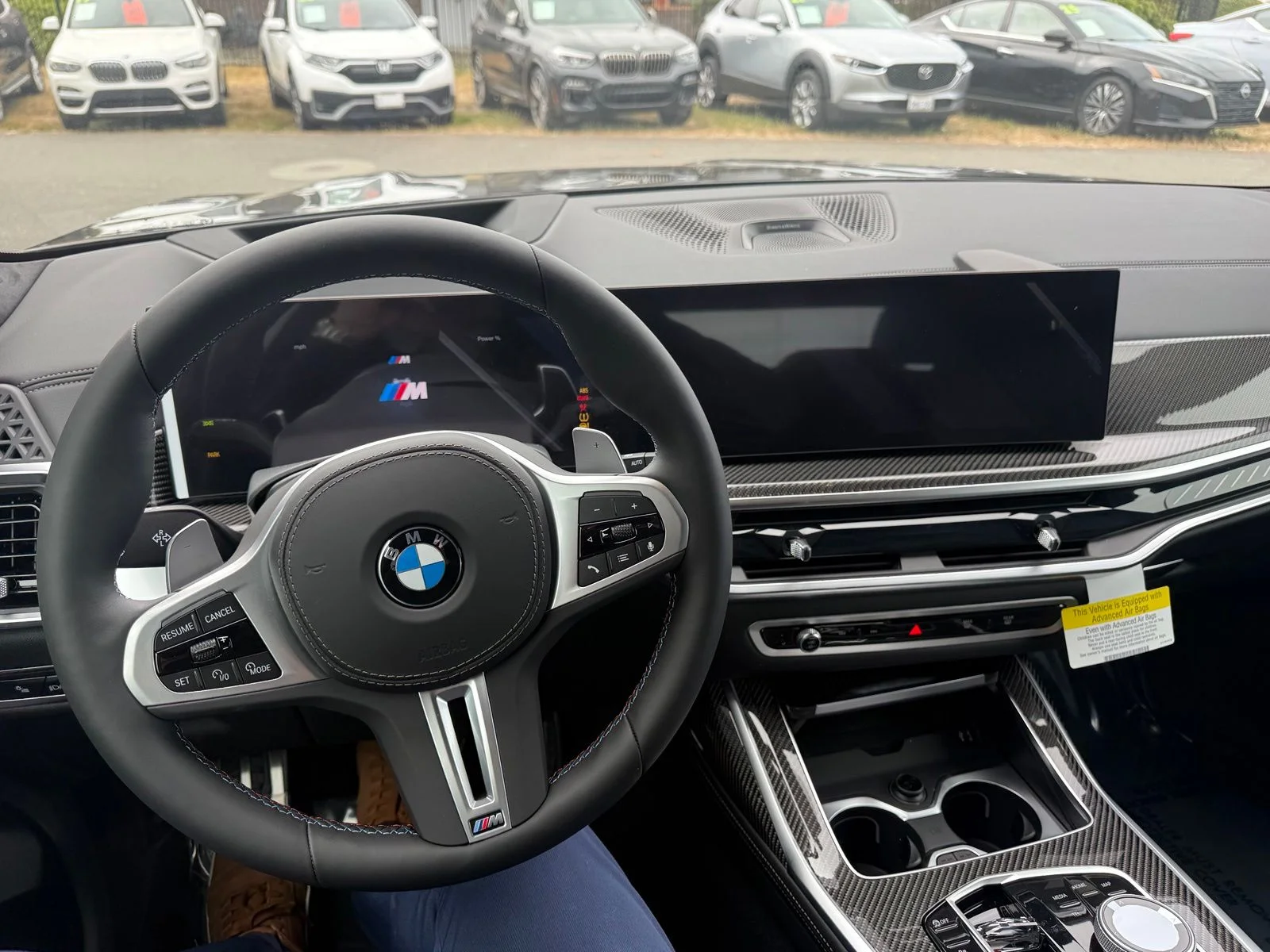New 2027 Black Sapphire Metallic BMW M60i image 14