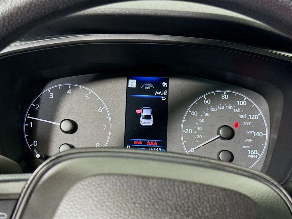 Certified Used 2023 Ruby Flare Pearl Toyota LE image 12