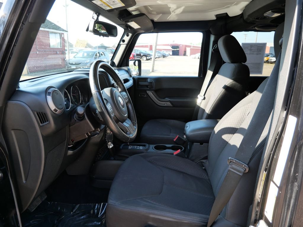 Used 2013 Black Jeep Unlimited Sport image 14