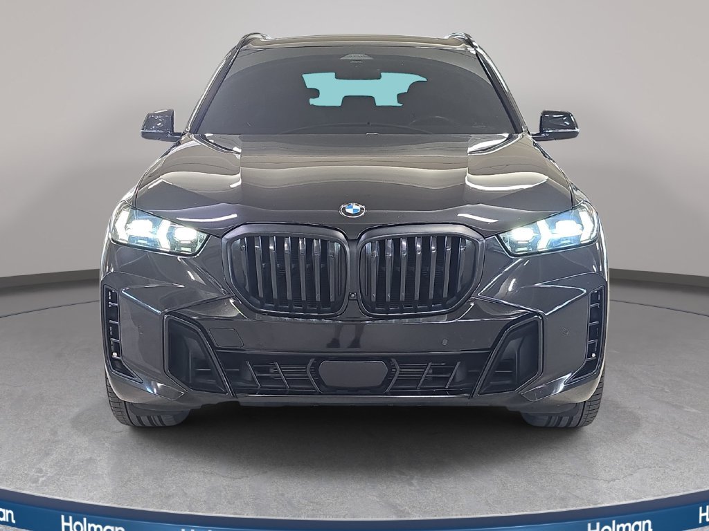 Certified Used 2025 Black Sapphire Metallic BMW sDrive40i image 3