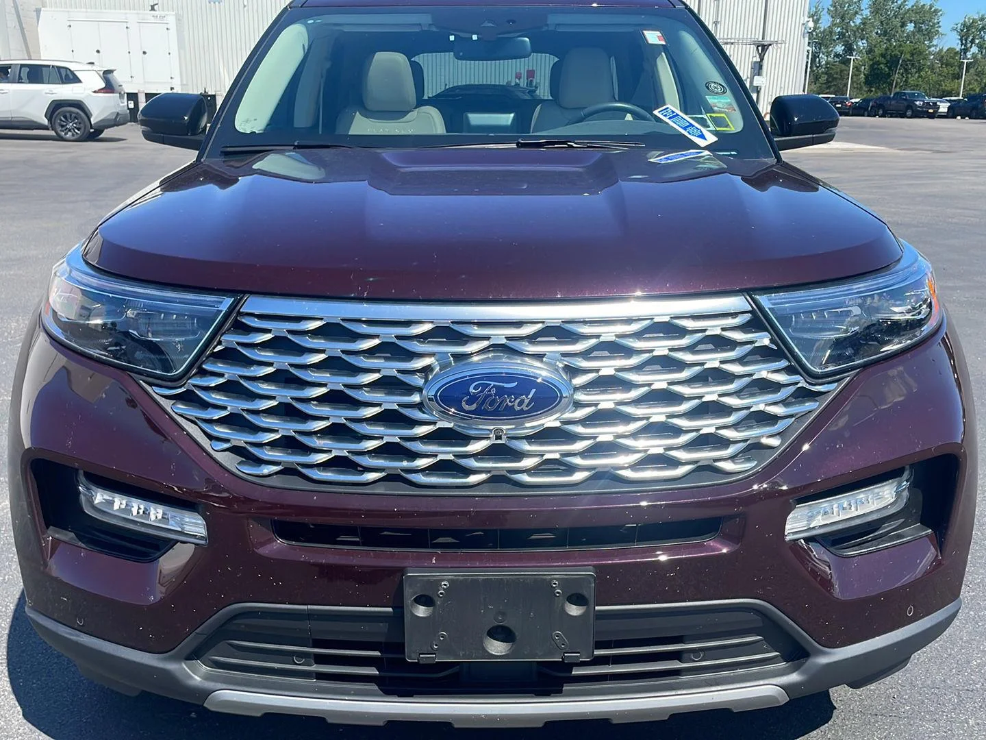 Used 2023 Jewel Red Metallic Tinted Clearcoat Ford Platinum image 7