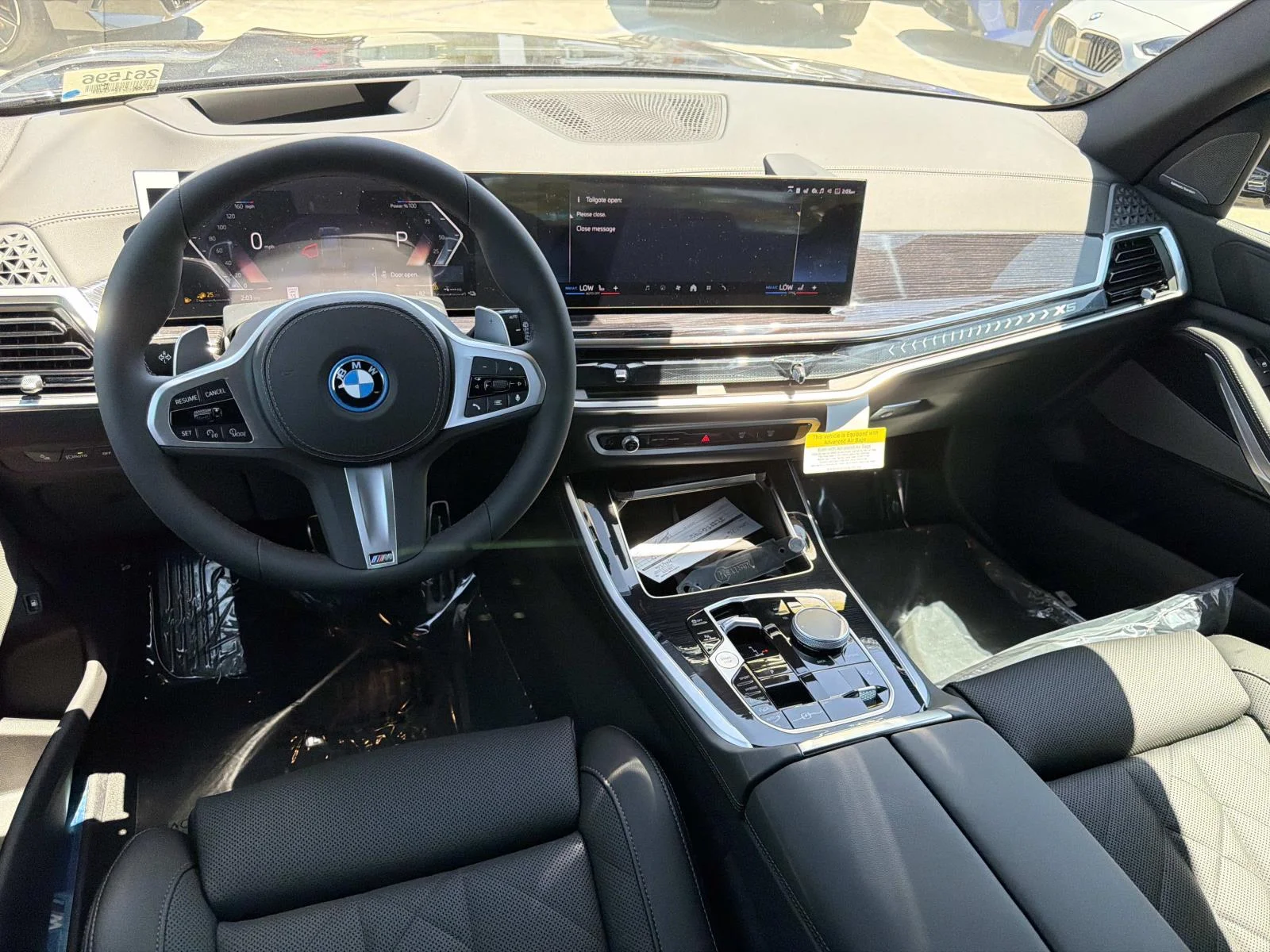 New 2026 Black Sapphire Metallic BMW xDrive50e image 7