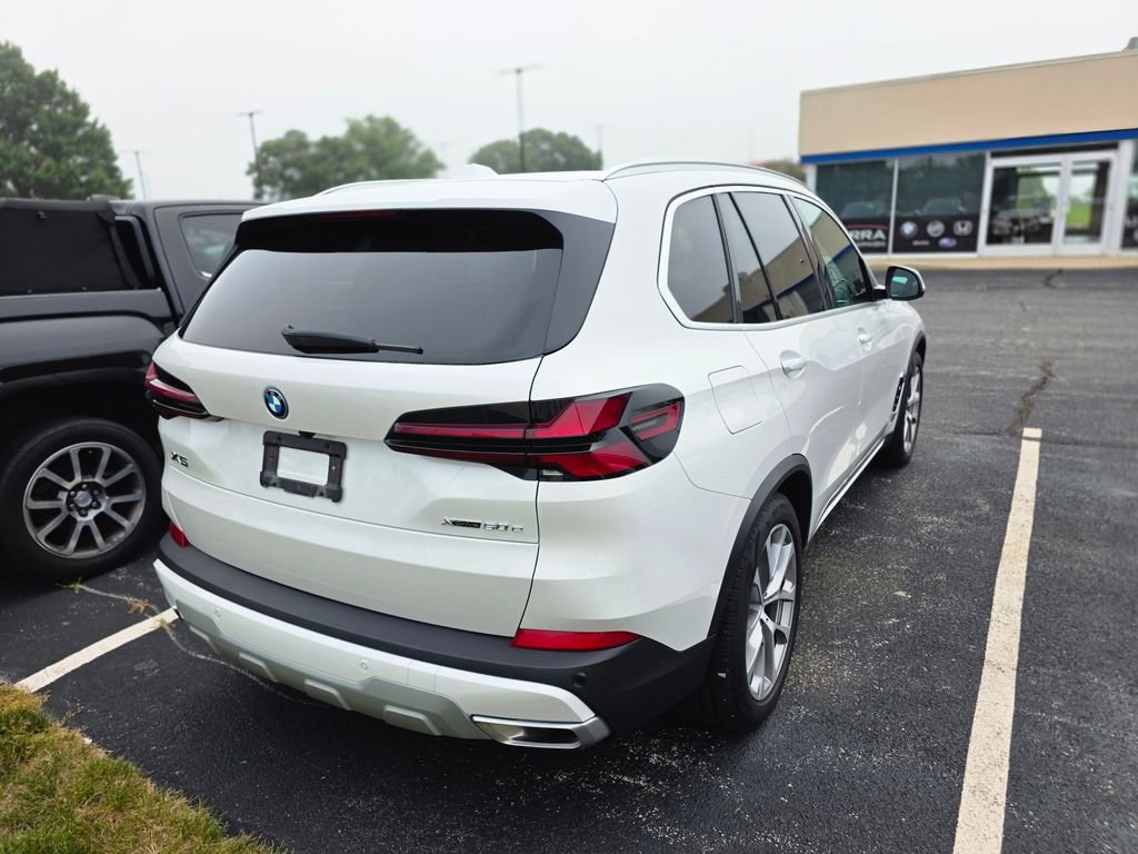 Used 2024 Mineral White Metallic BMW xDrive50e image 4