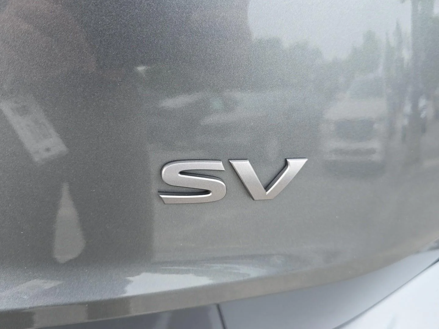 Used 2024 Gun Metallic Nissan SV image 5