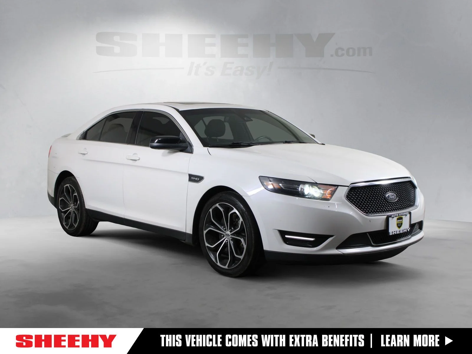 Used 2016 White Ford SHO image 1