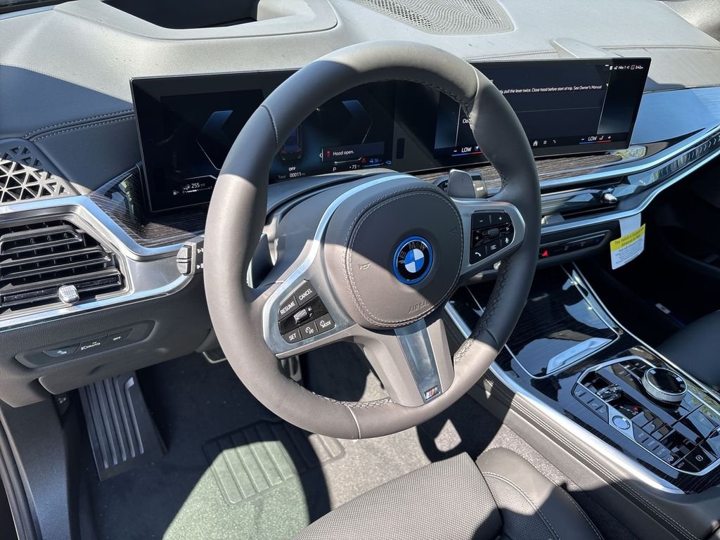 New 2026 Black Sapphire Metallic BMW xDrive50e image 11