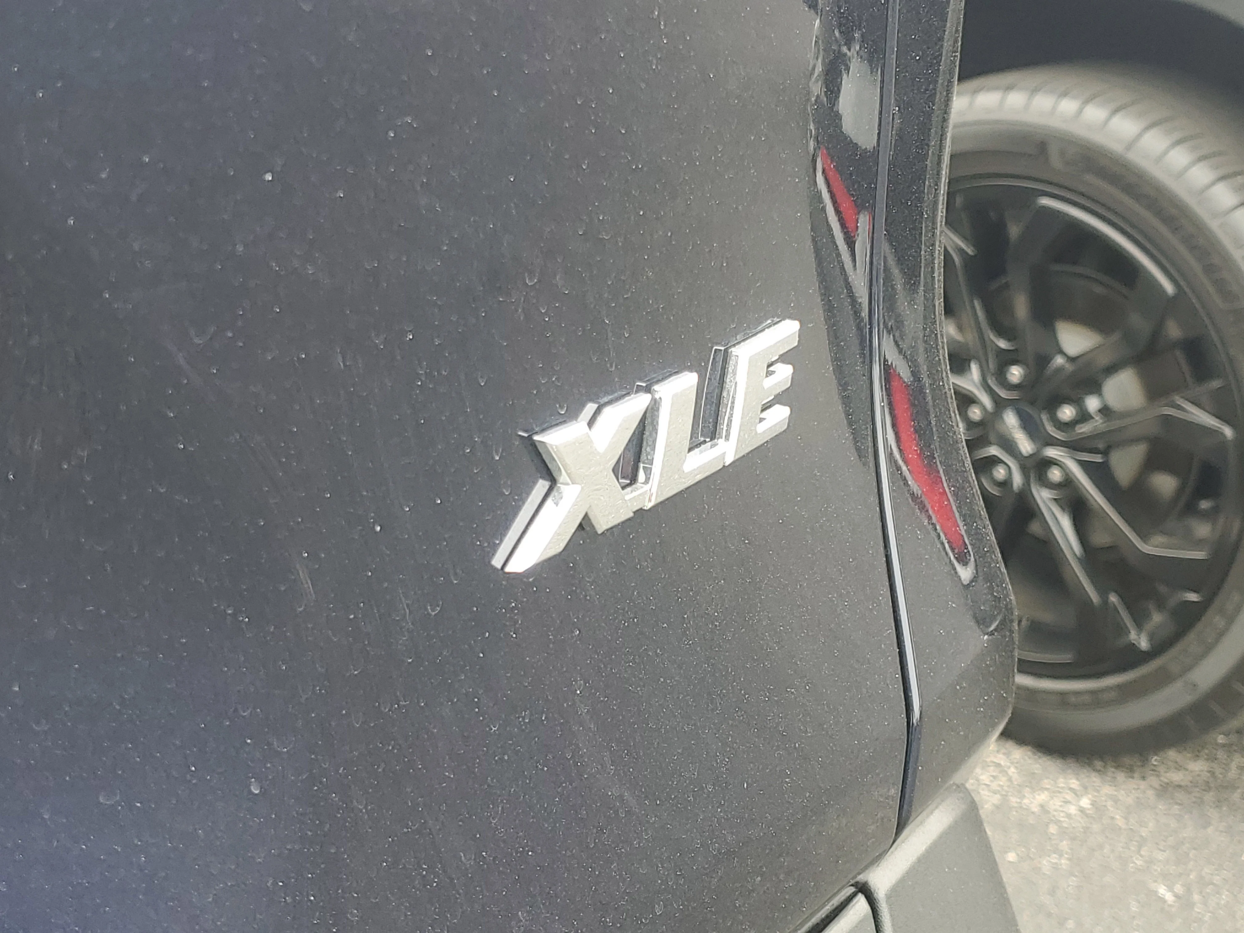 Used 2025 Midnight Black Metallic Toyota XLE Premium image 8