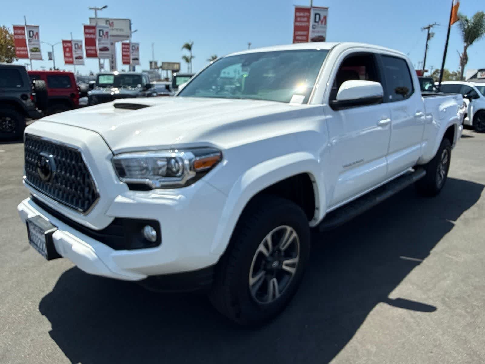Used 2019 Super White Toyota TRD Sport image 1