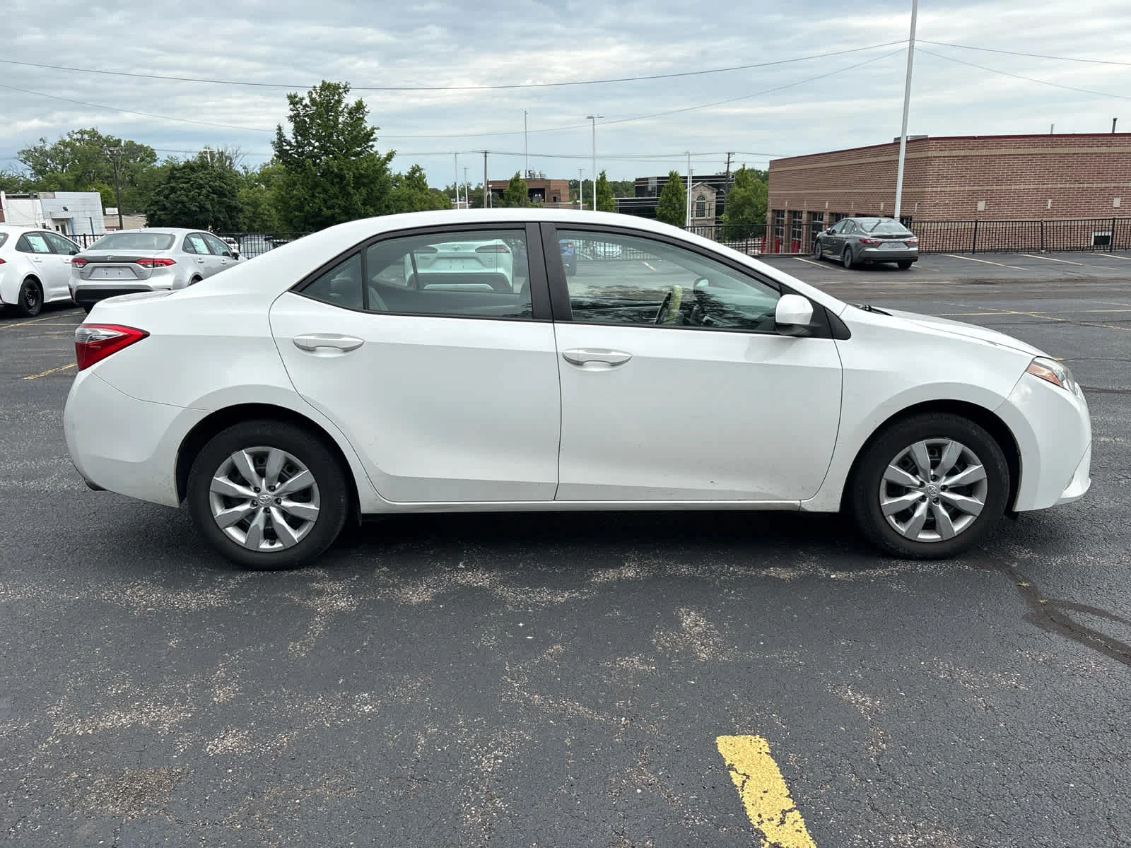 Used 2015 Super White Toyota LE image 14