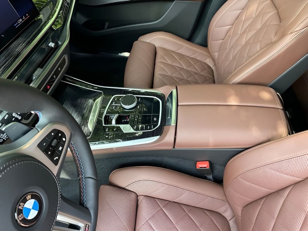 New 2026 Black Sapphire Metallic BMW M60i image 21