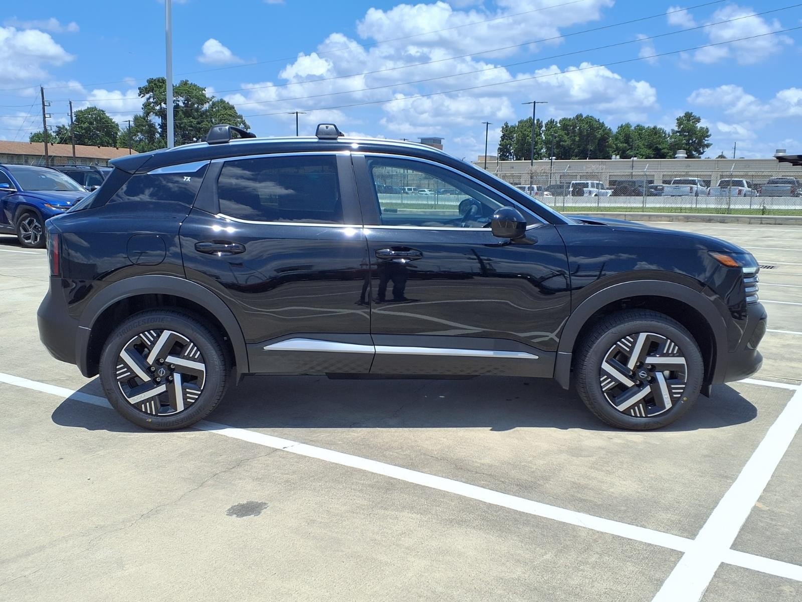 New 2026 Super Black Nissan SV image 4