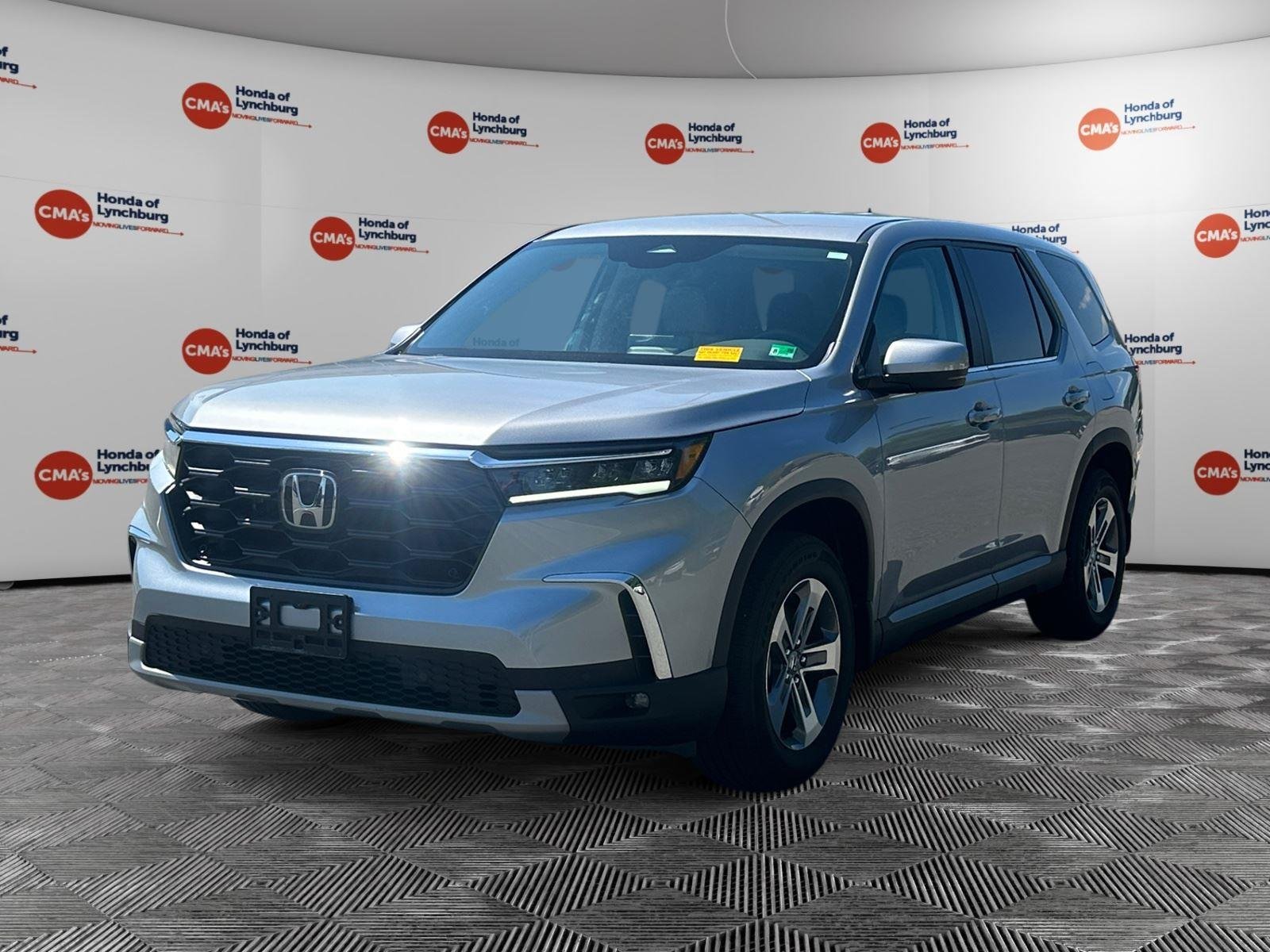Used 2023 Lunar Silver Metallic Honda EX-L 7 Passenger image 1