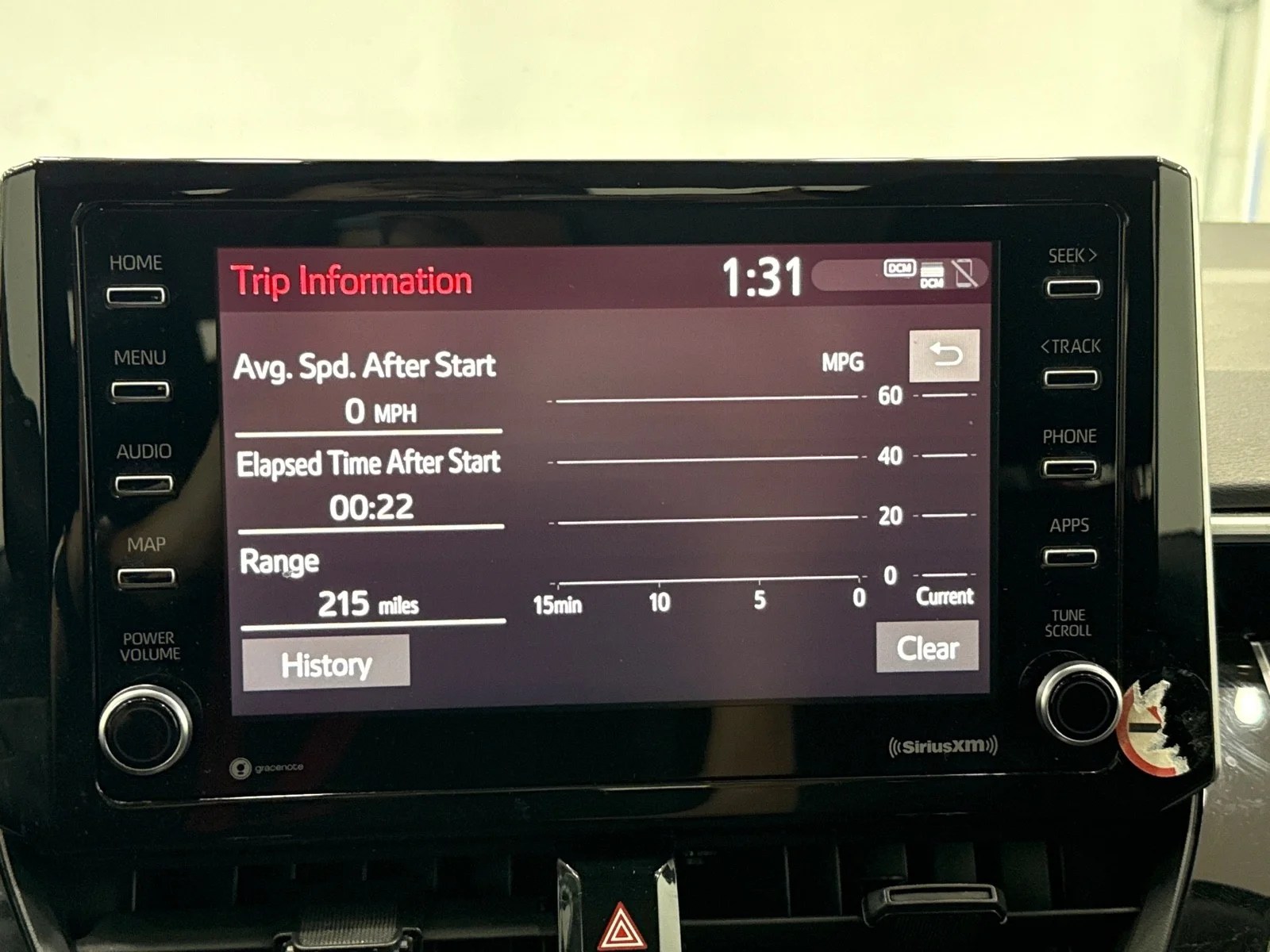 Used 2021 Barcelona Red Metallic Toyota LE image 16
