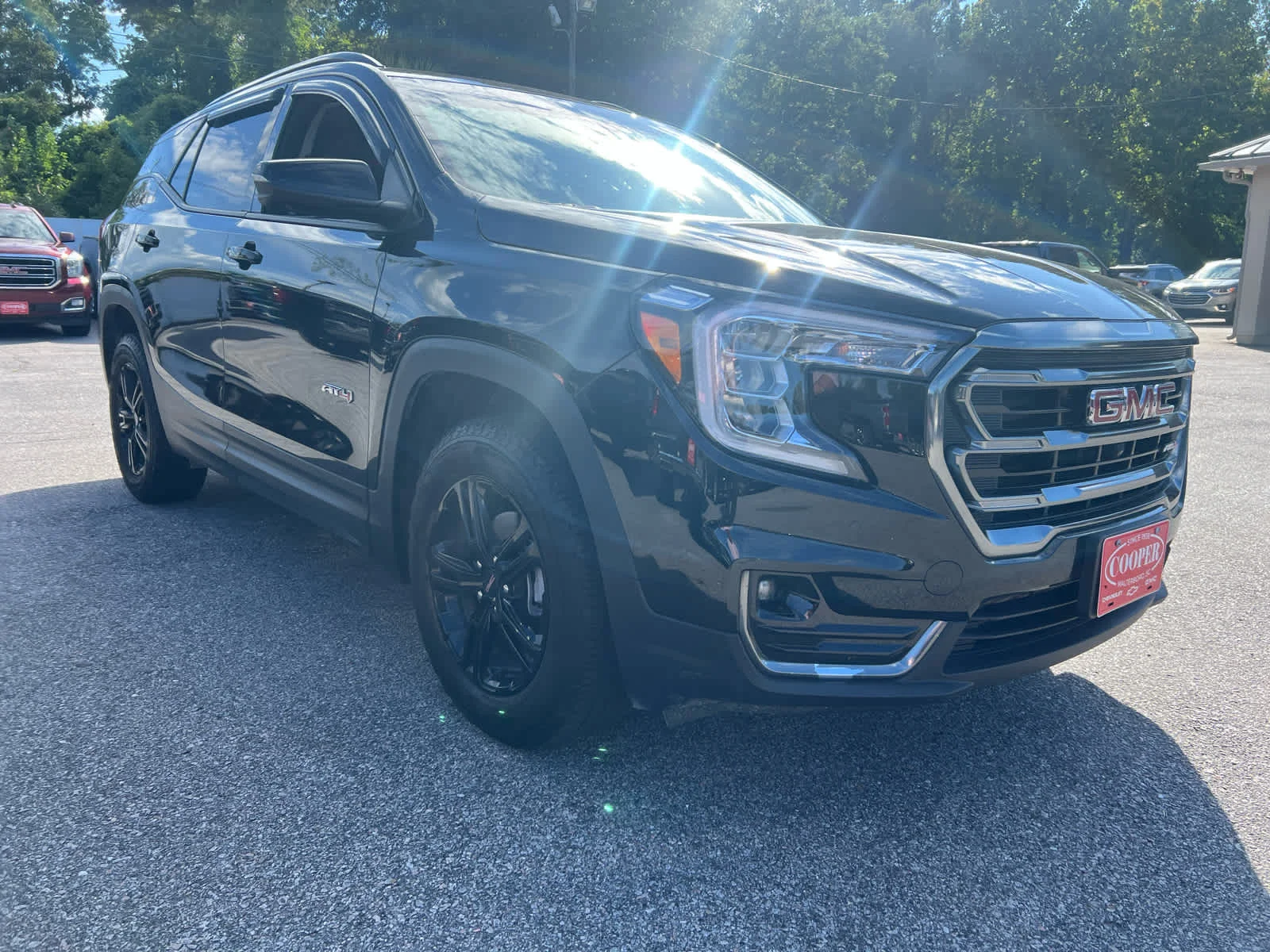 Used 2024 Ebony Twilight Metallic GMC AT4 image 3