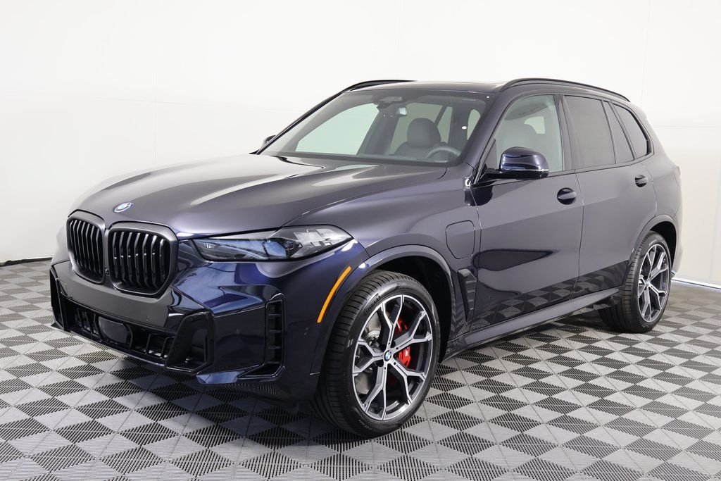 New 2026 Carbon Black Metallic BMW xDrive50e image 1