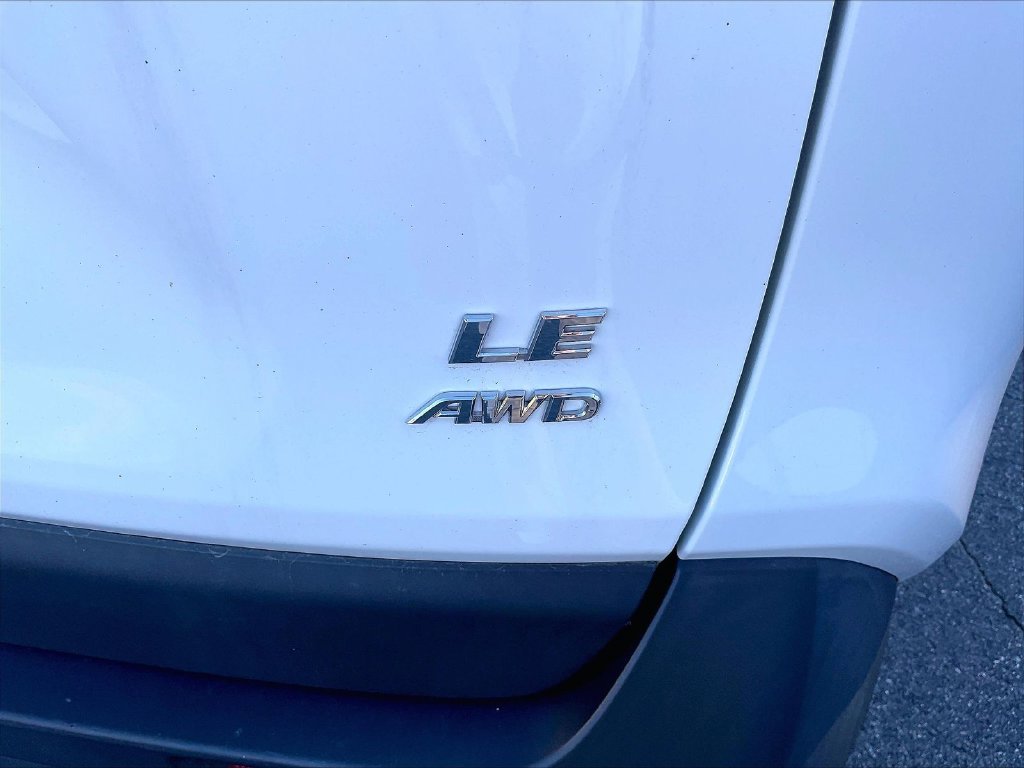 Used 2021 Super White Toyota LE image 27