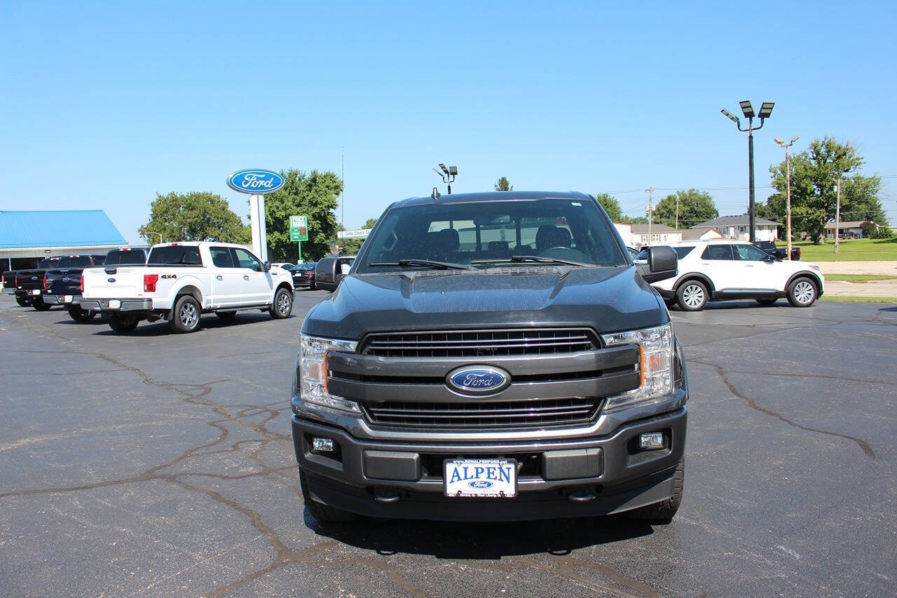 Used 2018 Magnetic Ford Lariat 4x4 4dr SuperCrew 5.5 ft. SB image 6