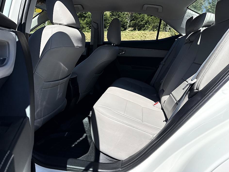 Used 2016 Super White Toyota LE image 12