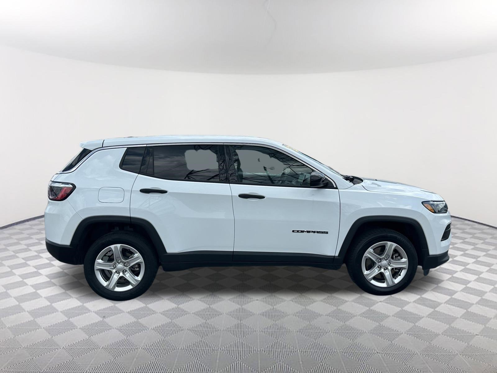 Used 2023 Bright White Clearcoat Jeep Sport image 4