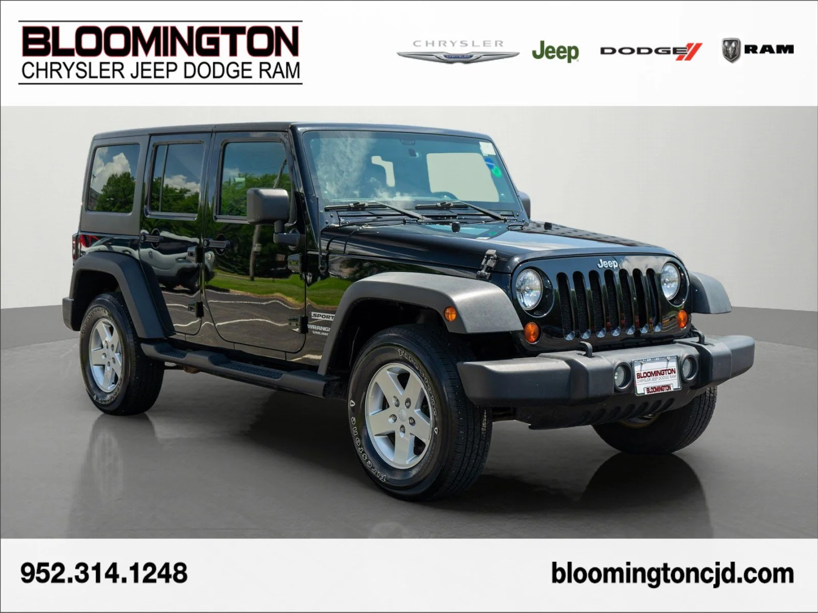 Used 2012 Black Clearcoat Jeep Unlimited Sport image 1