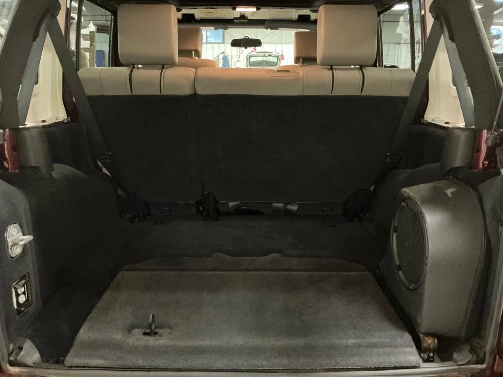 Used 2010 Red Jeep Unlimited Sahara image 23