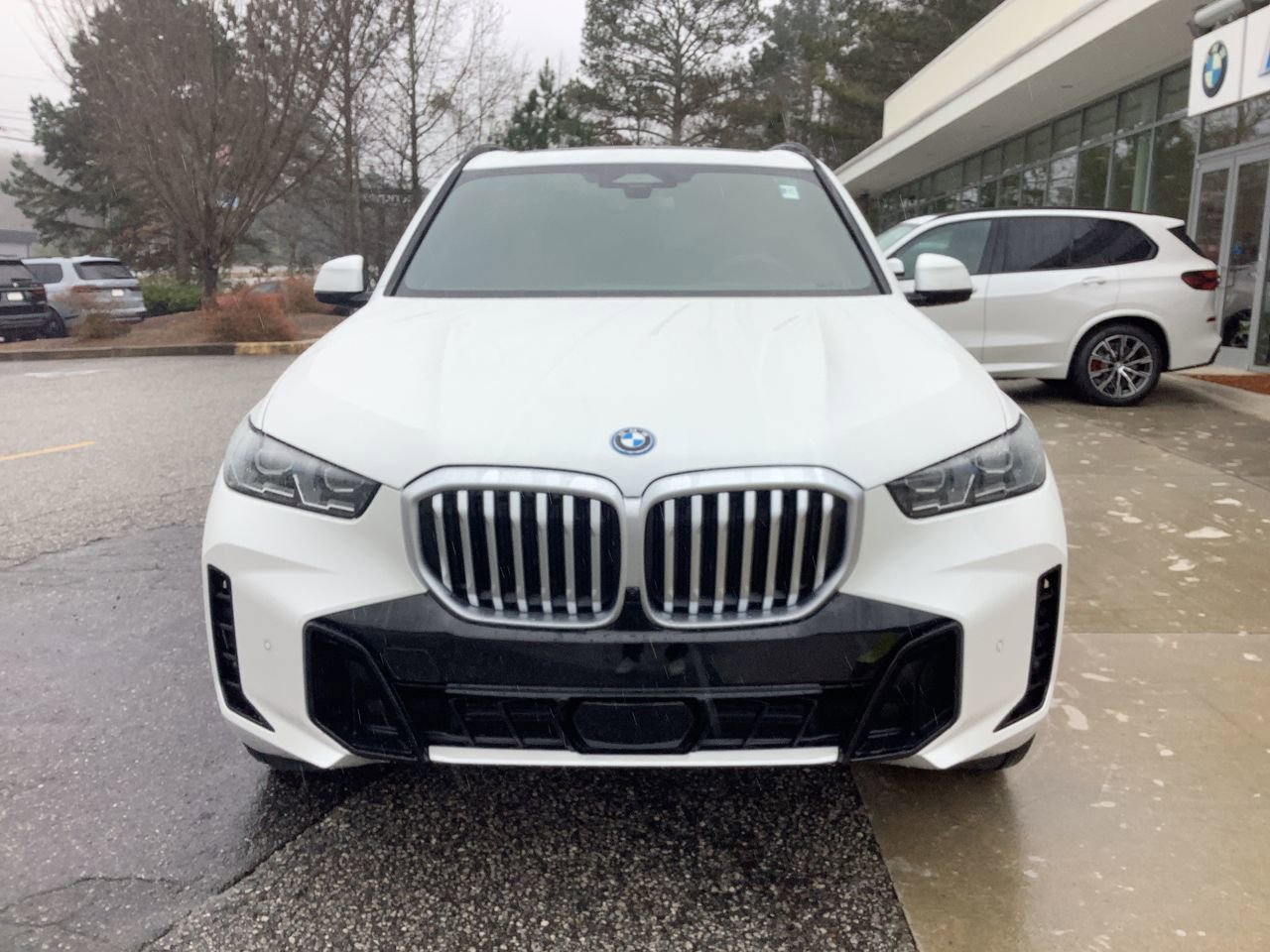 Used 2026 Mineral White Metallic BMW xDrive50e image 3