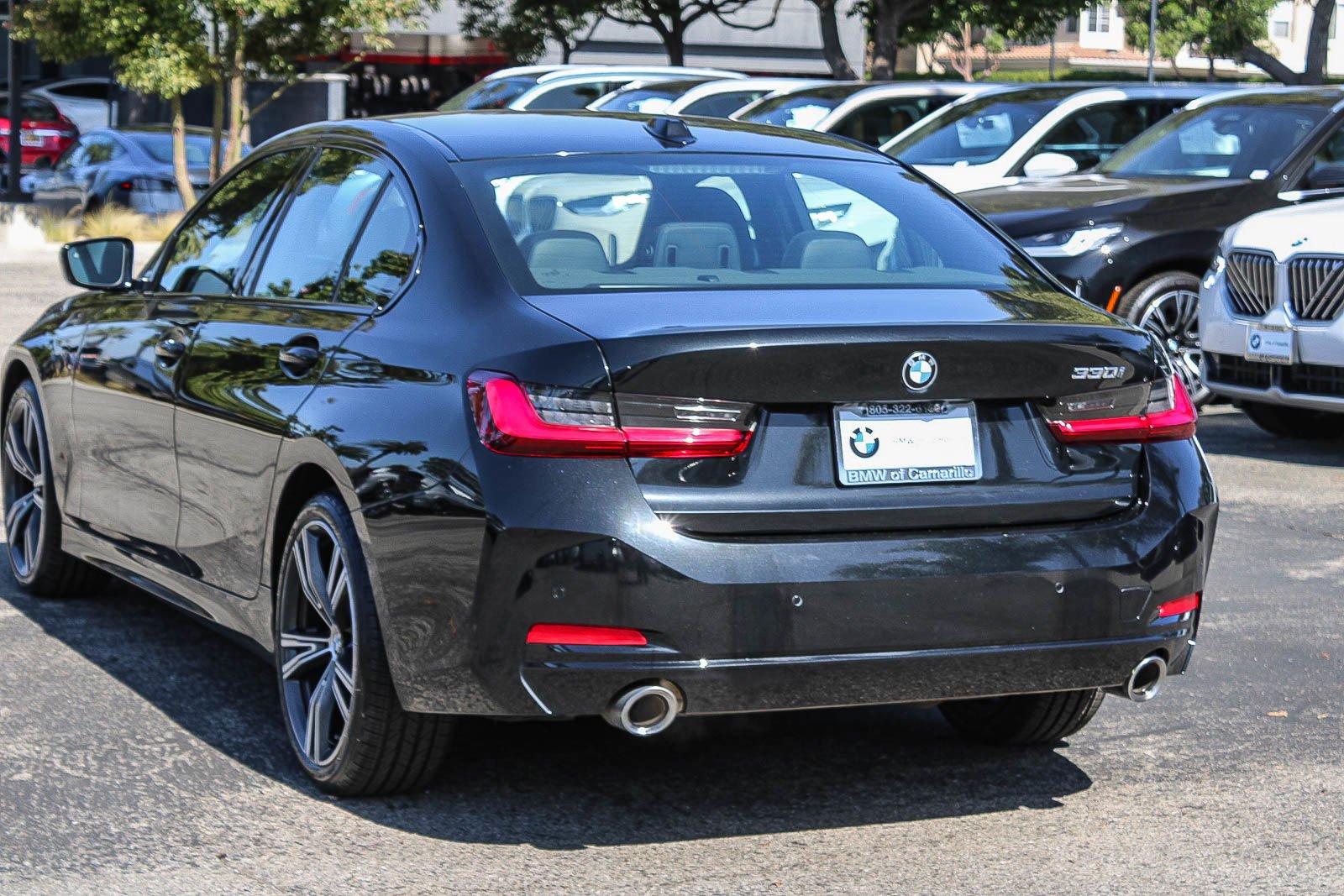 Used 2023 Black Sapphire Metallic BMW 330i image 4