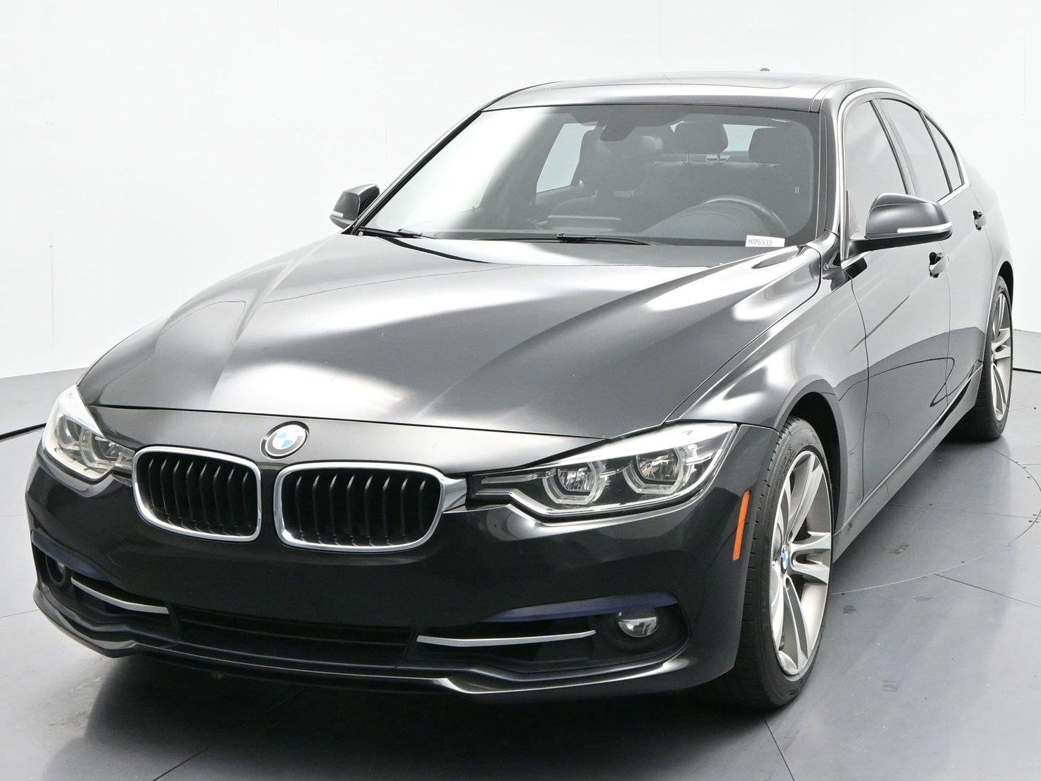 Used 2018 Black Sapphire Metallic BMW 330i image 3