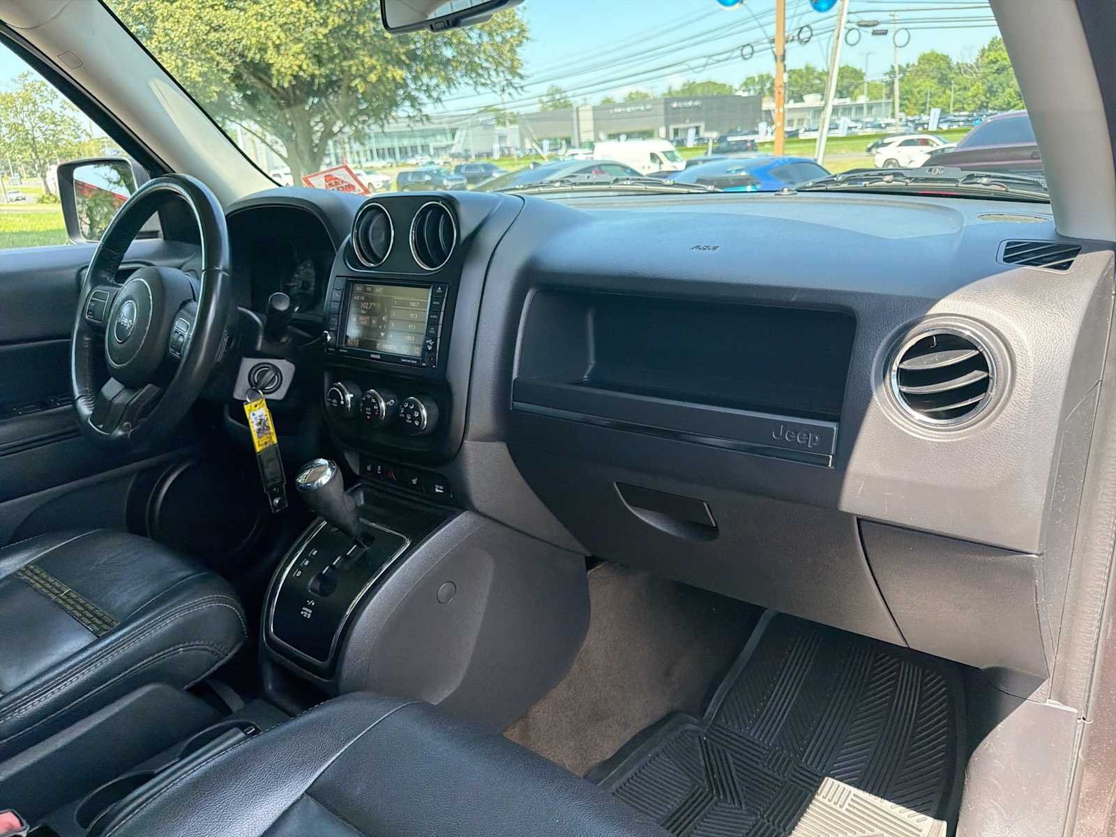 Used 2016 Granite Crystal Metallic Clearcoat Jeep High Altitude Edition image 16